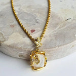 Gold-plated Baroque Pearl Necklace featuring a natural baroque pearl pendant with rhinestones, designed to enhance your natural elegance. Crafted from stainless steel with 18K gold-plating, waterproof, hypoallergenic, and tarnish-resistant.