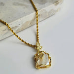 Gold-plated Baroque Pearl Necklace featuring a natural baroque pearl pendant with rhinestones, designed to enhance your natural elegance. Crafted from stainless steel with 18K gold-plating, waterproof, hypoallergenic, and tarnish-resistant.
