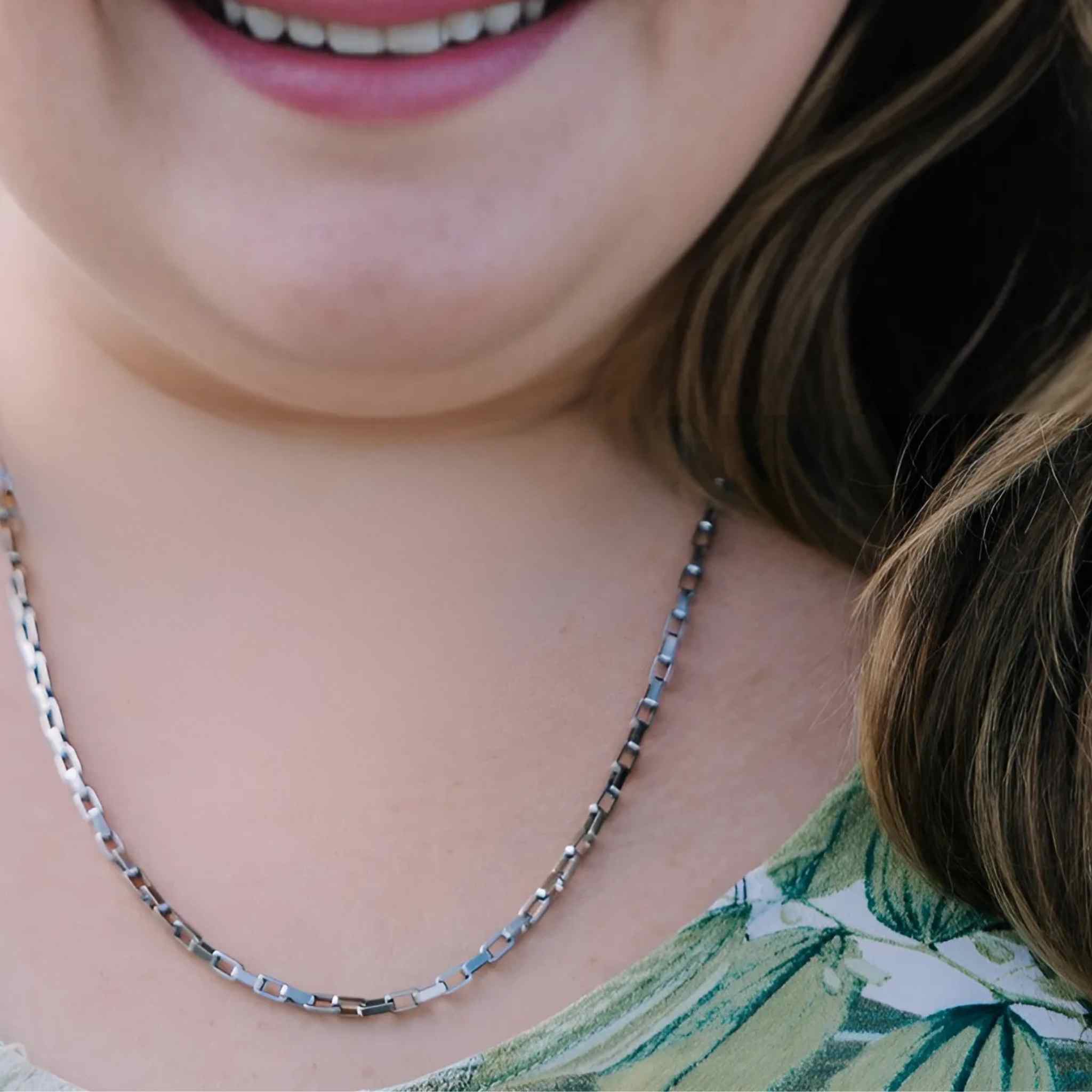 Bold Links silver necklace in 60cm length with chunky chain design, worn by plus-size woman for a modern, statement look