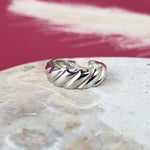 Classic silver Crescent Elegance Open Ring with curved, minimalist design"