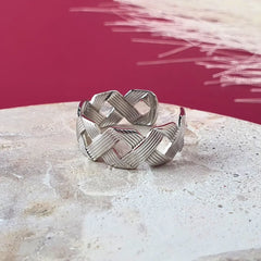Minimalist silver crisscross adjustable ring with flexible resizeable band and smooth finish