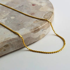 Delicate Twist Chain Necklace in 18K gold-plated featuring a simple twist design. Available in 45cm+5cm and 60cm+5cm lengths, perfect for layering or wearing solo.