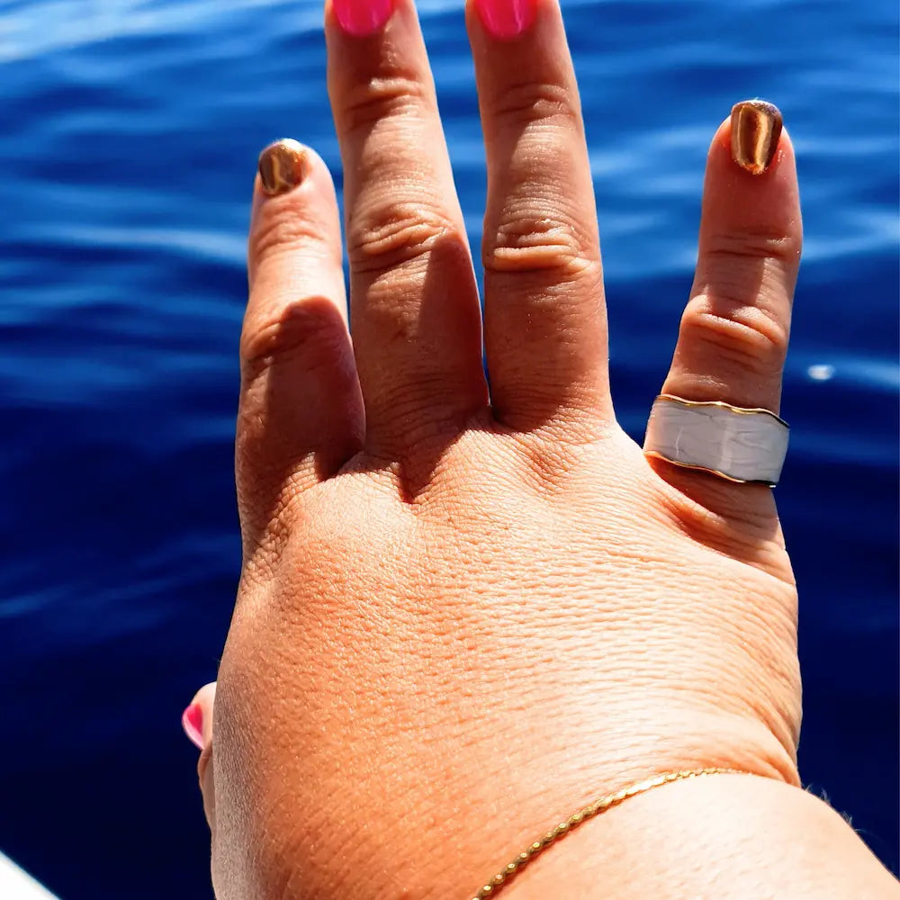 Size 9 Timeless elegance open ring on a plus size woman. Stunning unique and bold ring in gold and white. 