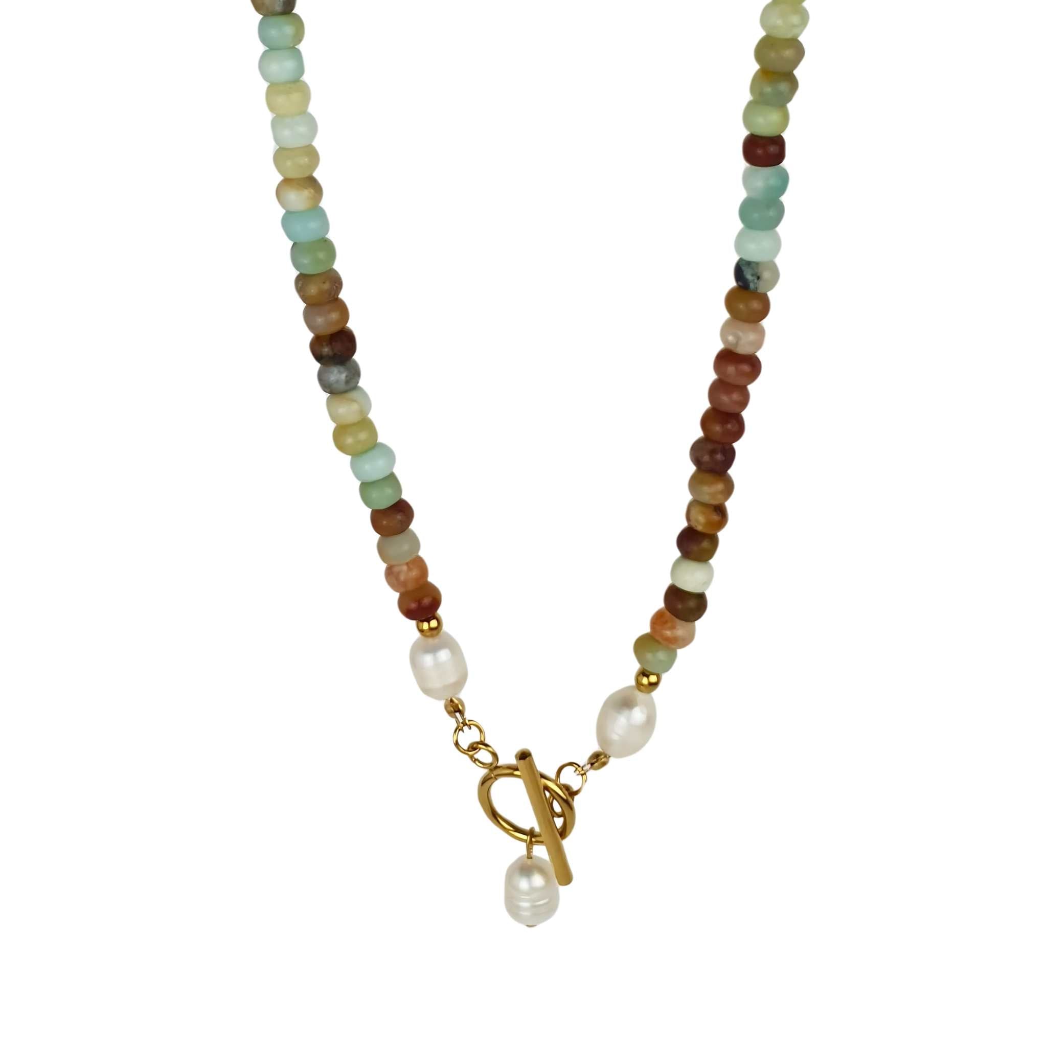 Emerald City Freshwater Pearl Necklace featuring lustrous pearls and a stylish gold toggle clasp, available in 50cm and 60cm lengths. Made with 18K gold-plating for a bold, luxurious look.