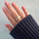 Eternal Hearts adjustable ring in gold-plated stainless steel with twin heart design and white oil-drip enamel detailing