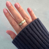 Eternal Hearts adjustable ring in gold-plated stainless steel with twin heart design and white oil-drip enamel detailing