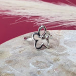 Cute flower adjustable ring in silver. Hypoallergenic and waterproof ring good for all sized fingers. 