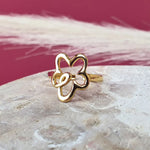 Cute flower adjustable ring in gold. Hypoallergenic and waterproof ring good for many different finger sizes. Rezieable and size-inclusive.