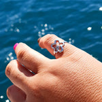 Plus size woman wearing cute flower adjustable ring in NZ. Waterproof and hypoallergenic. 