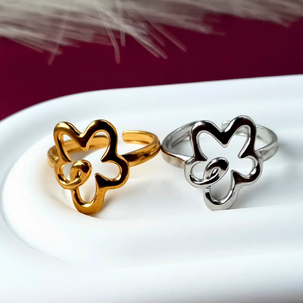 Flower power cute adjustable rings in both 18k gold plated and silver on a stainless steel base. Great for kids, teens or adults. Resizeable, size-inclusive. 