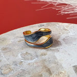 Flowing Waters Adjustable Rings in 18K gold-plating and black oil-dripping. Stunning adjustable and resizeable ring. 