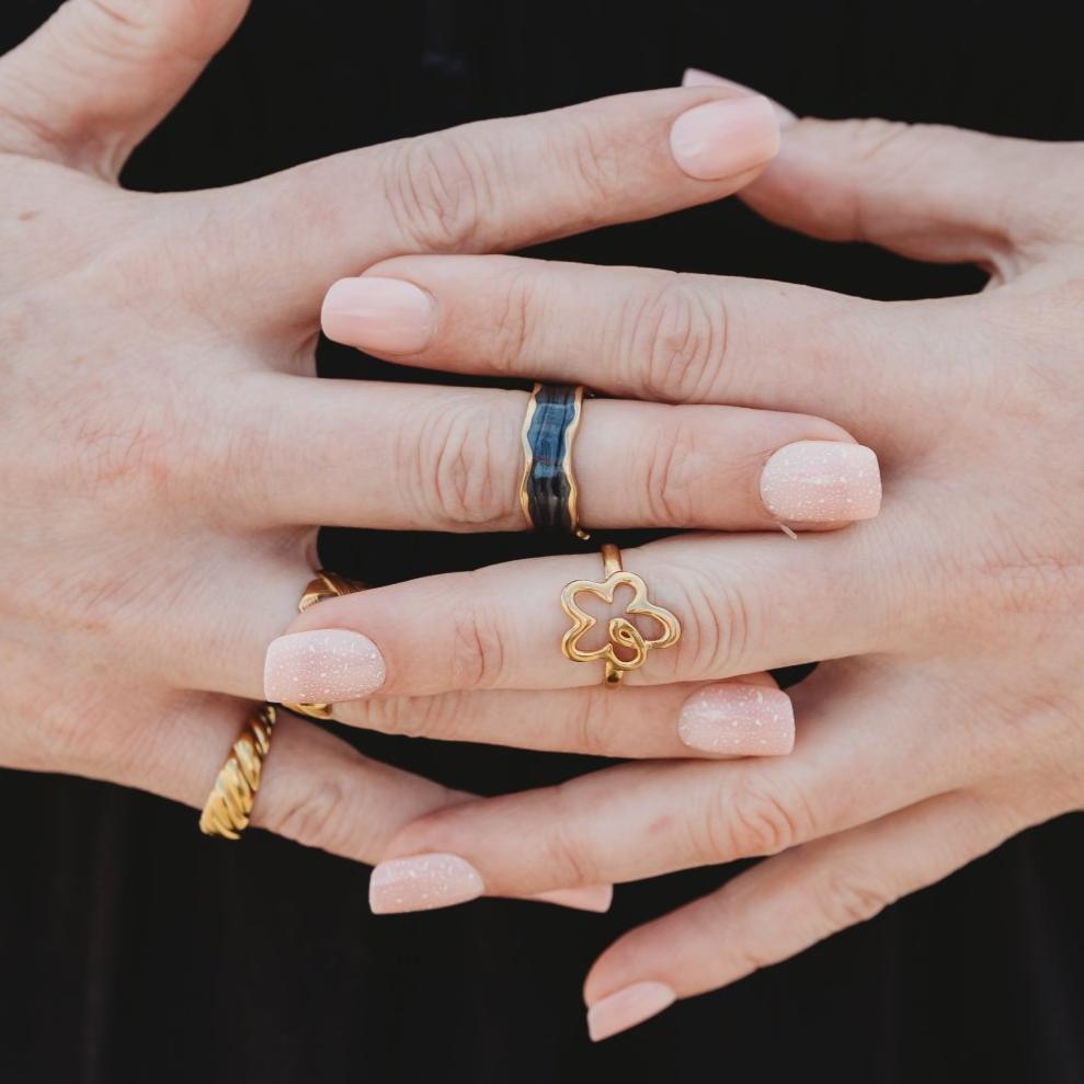 Three is always a vibe. This gold-plated ring stack features a bold mix of Divine Me favourites - waterproof, hypoallergenic, and ready to fit you perfectly.