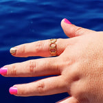 harmonic shapes adjustable ring in gold on a plus sized woman. Resizeable and size-inclusive adjustable ring. Great for gifting!