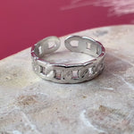 Silver adjustable ring with chunky linked chain texture and tarnish-resistant finish. Resizeable and size inclusive. 