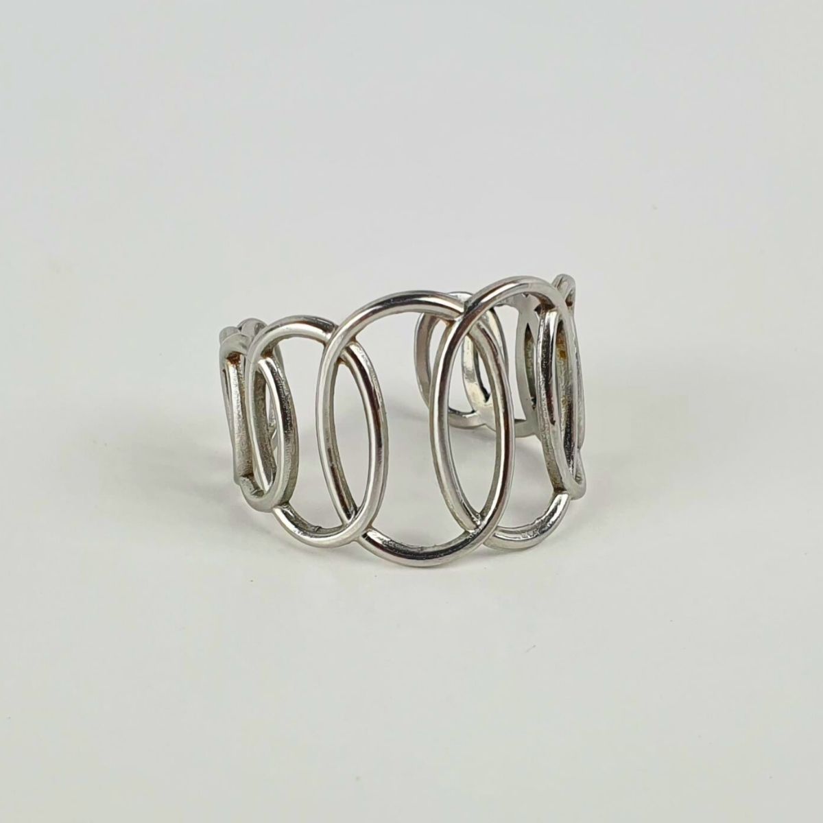 Twisted Ovals Adjustable Ring - Silver. Bold adjustable ring that fits all sizes.
