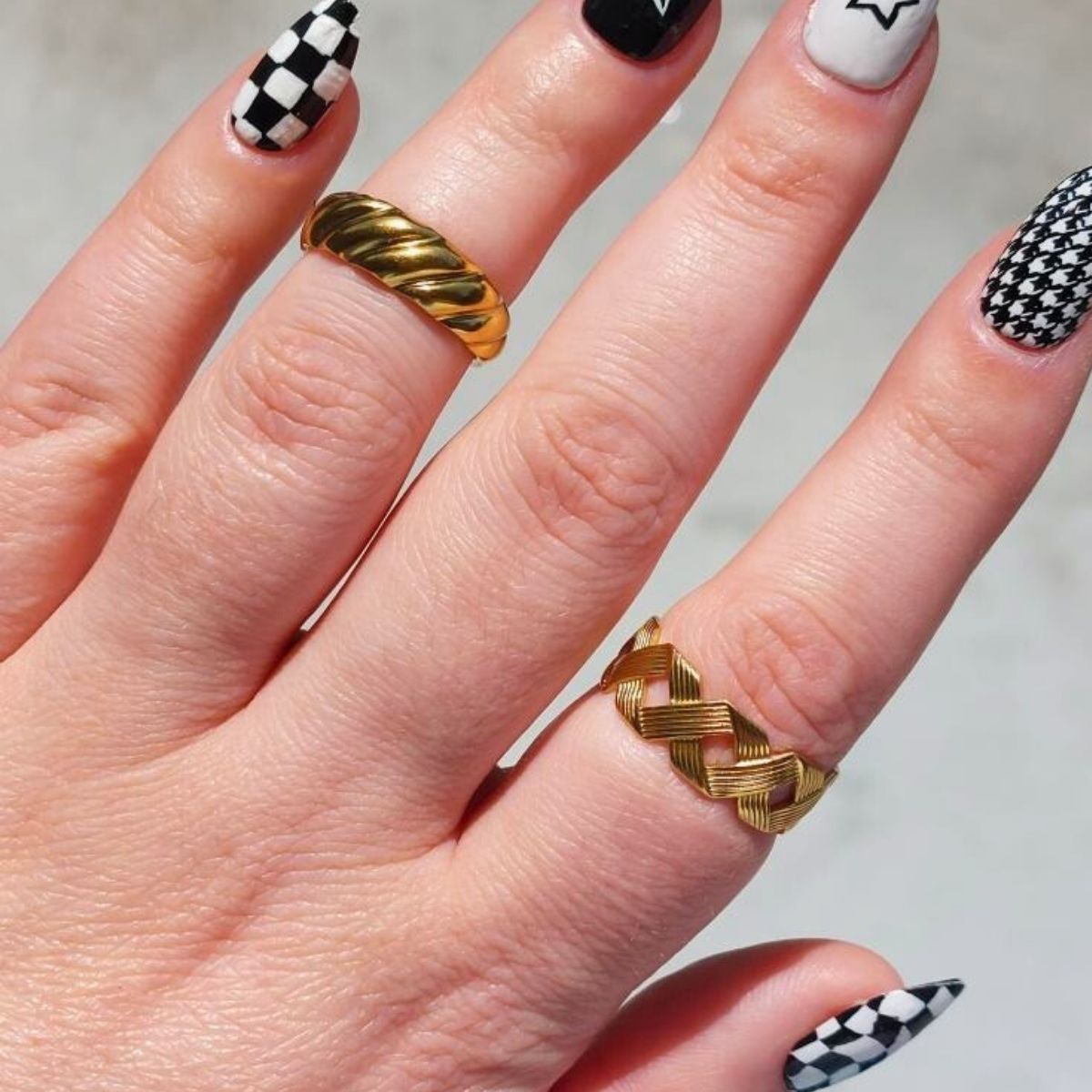 criss cross adjustable ring and crescent elegance open ring in gold p0lating on plus sized hand