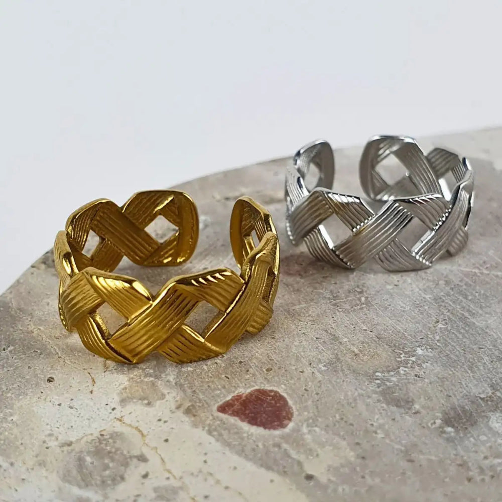 Size worries? Not here. This bold crisscross ring adjusts to many fingers. Available in gold or silver, and won’t tarnish or turn your skin green.