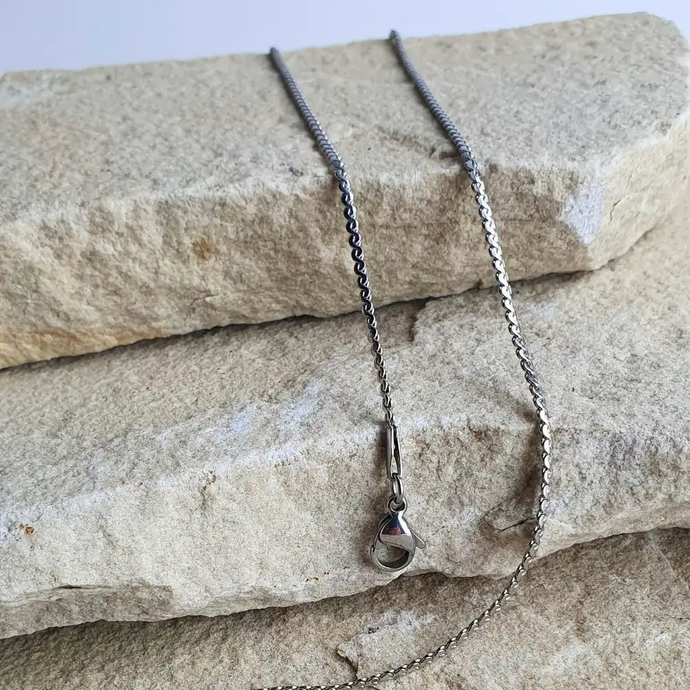 Silver stainless steel necklace and bracelet set with twist design and adjustable length