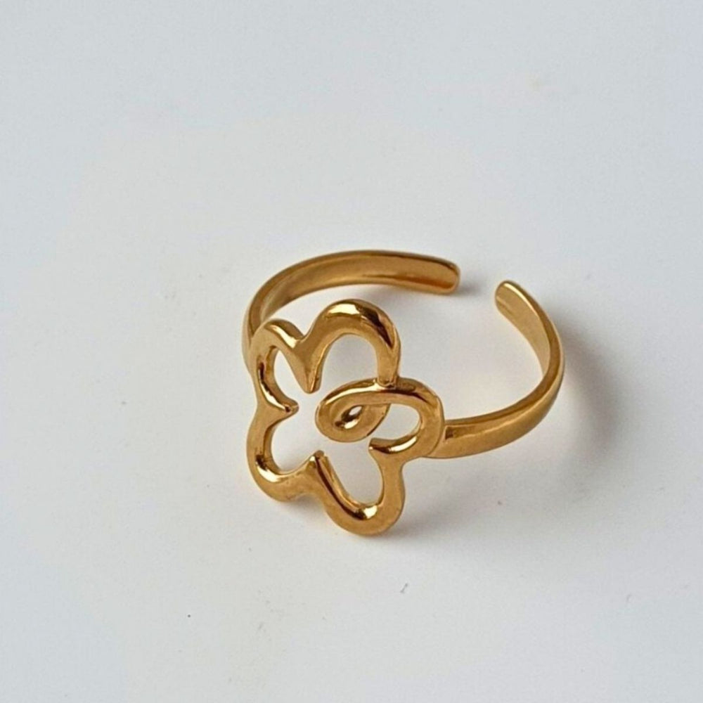 Cute flower adjustable ring in gold. Hypoallergenic and waterproof ring good for all sized fingers. 