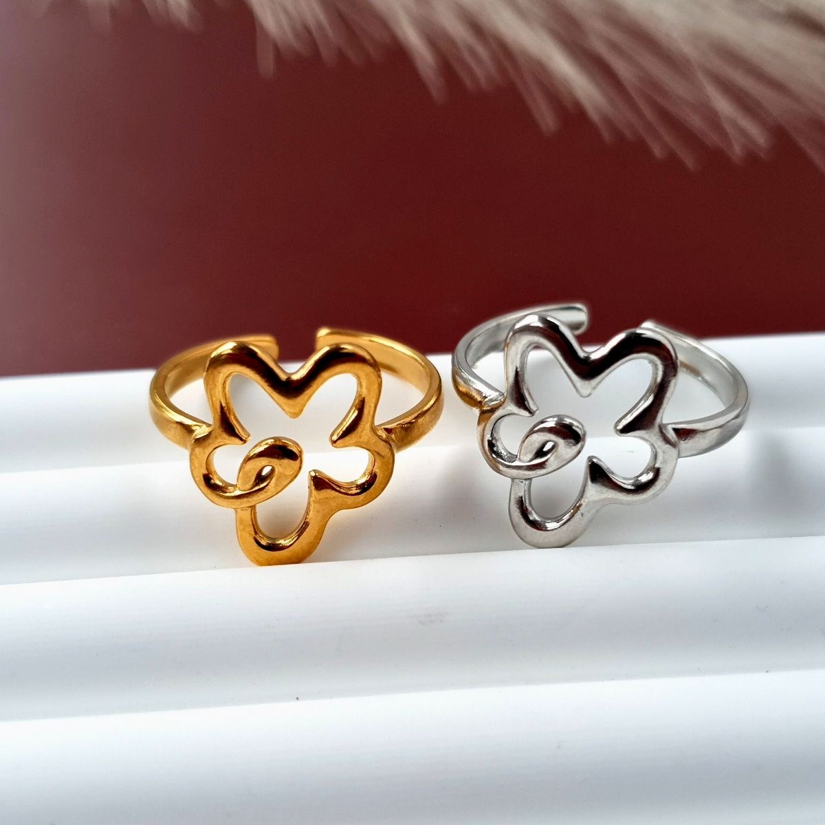 Flower power cute adjustable ring in both 18k gold plated and silver on a stainless steel base. Great for kids, teens or adults.