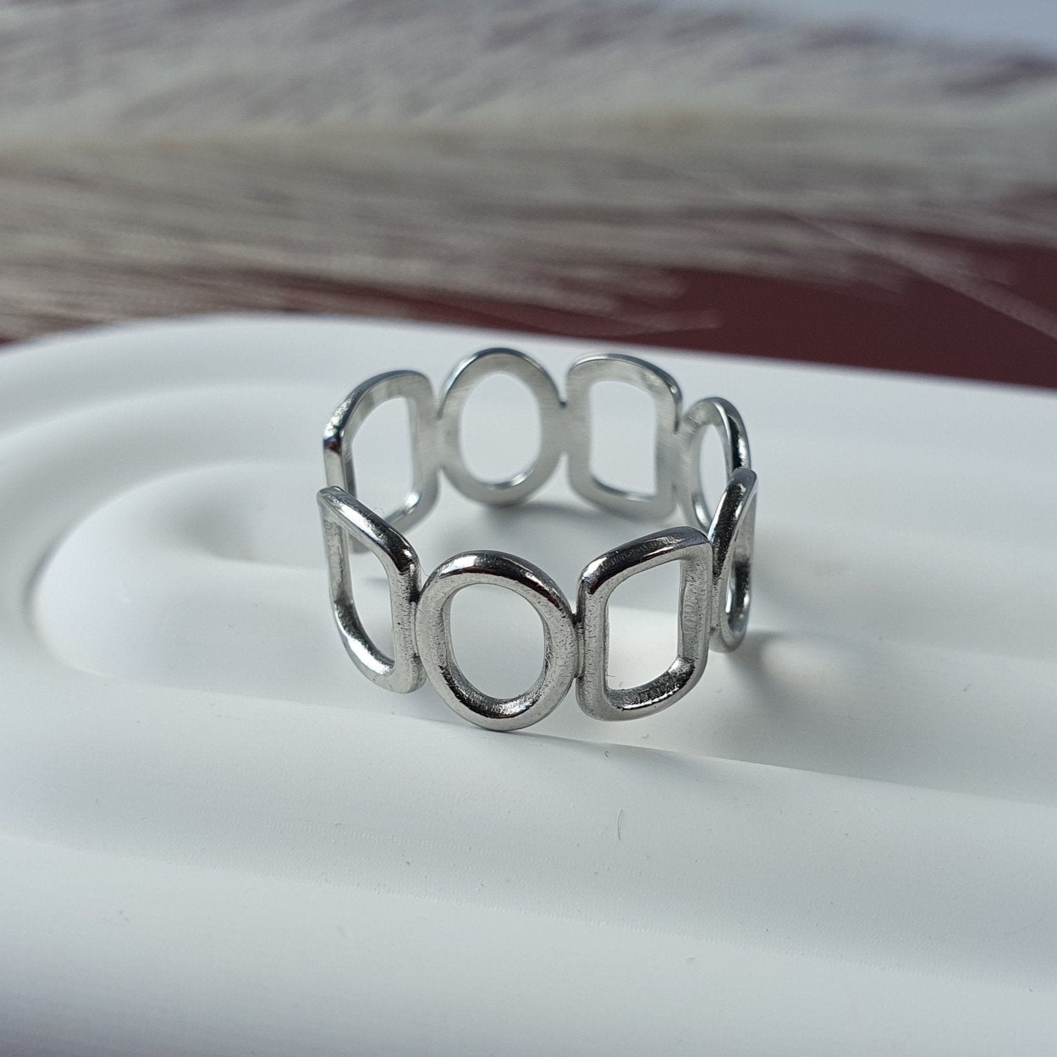 Harmonic shapes adjustable ring by Divine Me Essentials. Comfortably fit all sized fingers. 